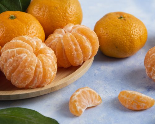 Close up photo of Fresh organic mandarins. High quality photo